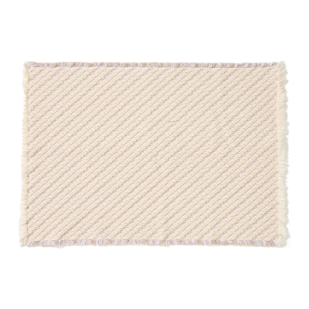 Béžová koupelnová předložka 50x70 cm Janu – Kave Home v:1827176